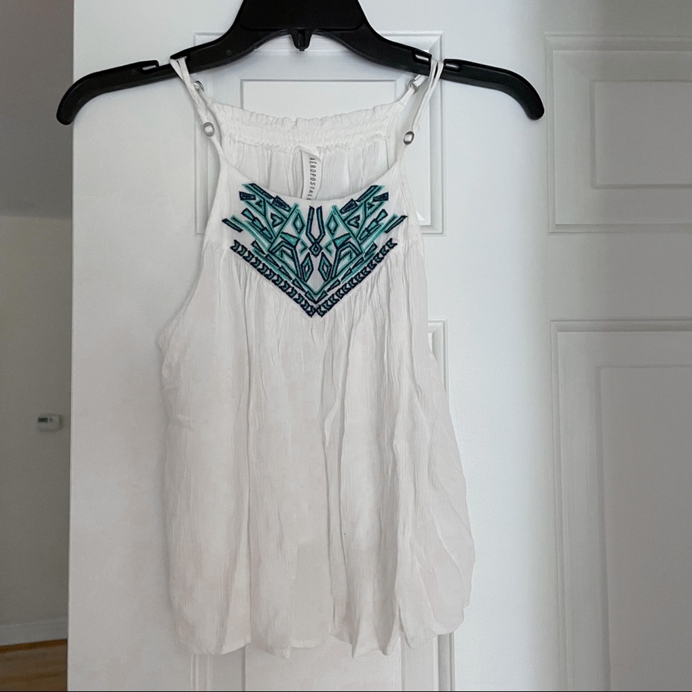 High neck white tank with turquoise embroidery